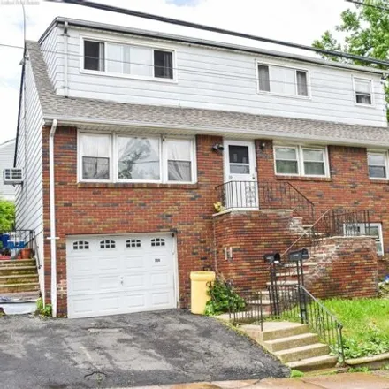 Rent this 2 bed house on 304-306 Caldwell Ave in Paterson, New Jersey