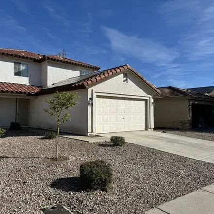 Rent this 4 bed house on 22838 West Cantilever Street in Buckeye, AZ 85326