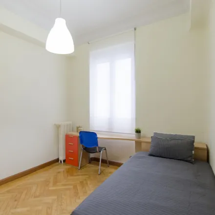 Rent this 6 bed room on Calle de Andrés Mellado in 72, 28015 Madrid