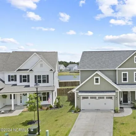 Buy this 4 bed house on North Wild Indigo Place in Surf City, NC 28445