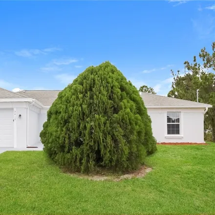 Rent this 3 bed house on 3413 22nd Street West in Lehigh Acres, FL 33971