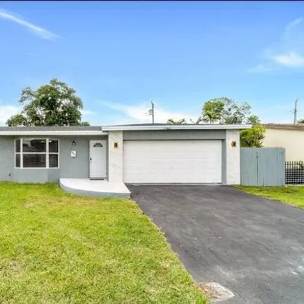 Buy this 4 bed house on 3967 Northwest 34th Avenue in Lauderdale Lakes, FL 33309