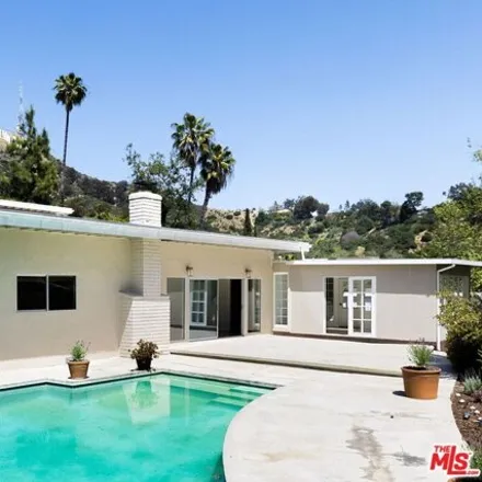 Rent this 4 bed house on Lake Hollywood Drive in Los Angeles, CA 90068
