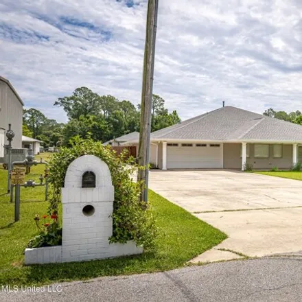 Rent this 4 bed house on 6912 Cheyenne Street in Saint Martin, Jackson County