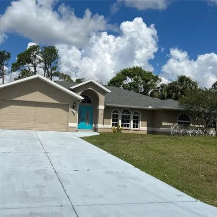Rent this 3 bed house on 2221 Tinker Street in Port Charlotte, FL 33948