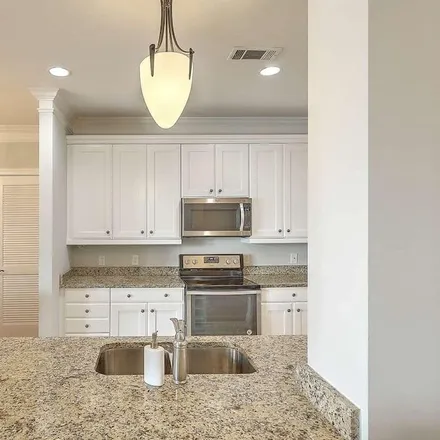 Rent this 2 bed condo on Charleston