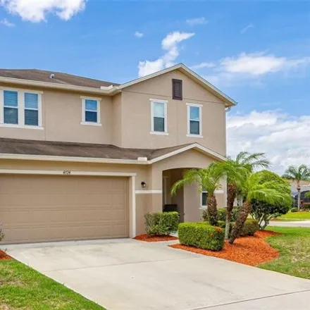 Rent this 4 bed house on 4724 Ruby Red Ln in Kissimmee, Florida