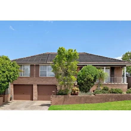 Rent this 3 bed apartment on Champion Street in Glenfield NSW 2167, Australia