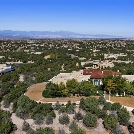 Buy this 4 bed house on 79 Sundance Drive in Santa Fe County, NM 87506