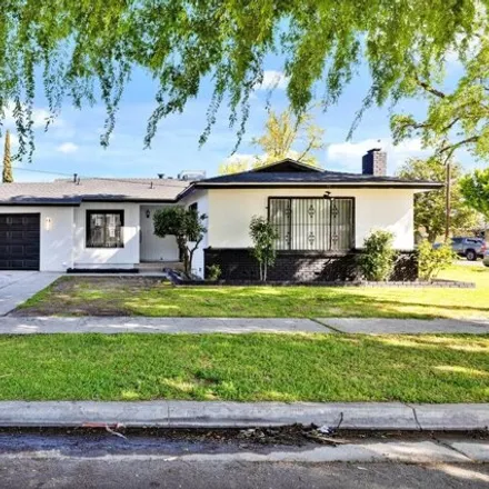 Buy this 3 bed house on 4599 East Woodward Avenue in Fresno, CA 93702