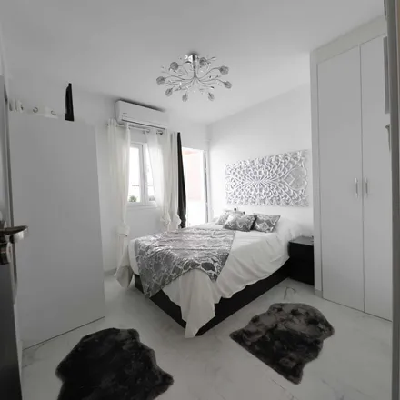 Rent this 16 bed room on Calle de Gijón in 28011 Madrid, Spain