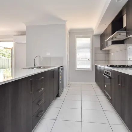 Rent this 4 bed apartment on 15 Leumeah Road in Glenroi NSW 2800, Australia