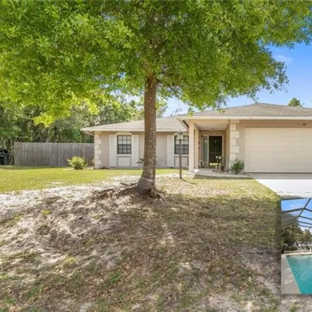 Buy this 3 bed house on Fuchsia Way in Palm Coast, FL 32137
