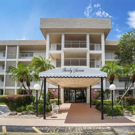 Rent this 2 bed condo on 3351 South Palm Aire Drive