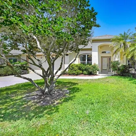 Buy this 4 bed house on 2430 Woodfield Circle in West Melbourne, FL 32904