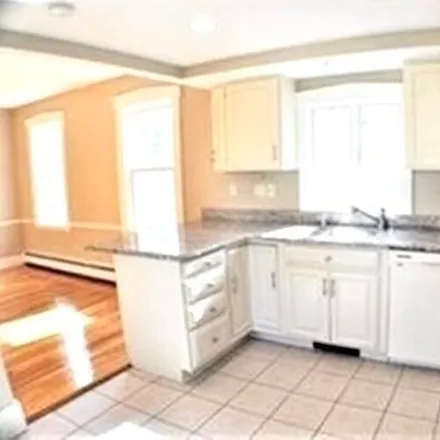 Rent this 2 bed townhouse on 583 Adams St