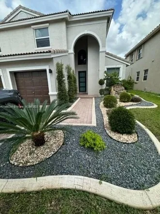 Buy this 5 bed house on 5461 Northwest 48th Street in Coconut Creek, FL 33073