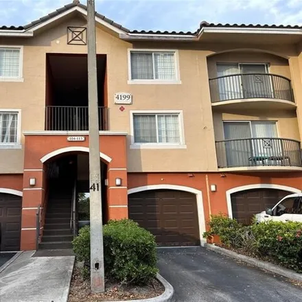 Rent this 3 bed condo on Earnest Street in West Palm Beach, FL 33417