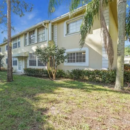 Buy this 2 bed condo on 1483 Palm Beach Trace Drive in Royal Palm Beach, Palm Beach County