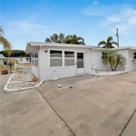 Rent this 3 bed house on 10447 120th Terrace North in Pinellas County, FL 33773