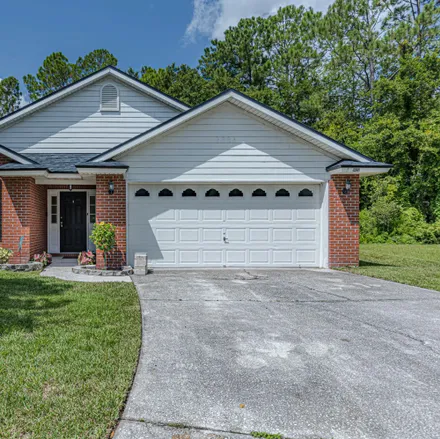 Buy this 4 bed house on 9834 Chirping Way in Jacksonville, FL 32222