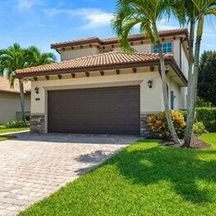 Rent this 4 bed house on 7014 Limestone Cay Road in Limestone Creek, Palm Beach County