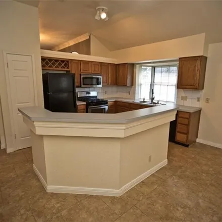 Rent this 3 bed apartment on 5912 Shanghai Pierce Road in Austin, TX 78749