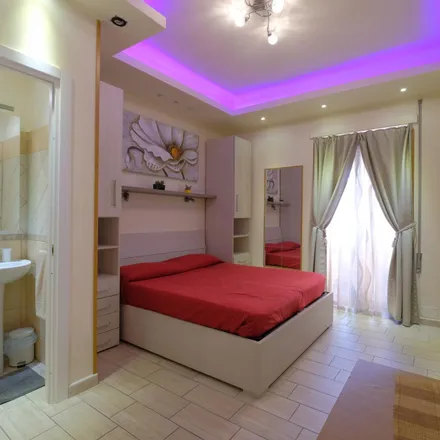 Rent this 5 bed room on Via Vetulonia in 00183 Rome RM, Italy