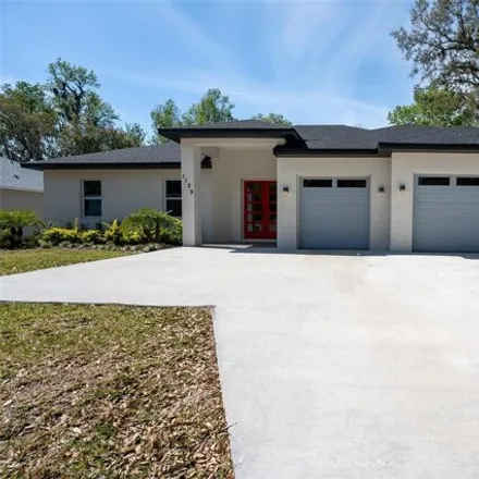Buy this 4 bed house on Ellington Place in Oviedo, FL 32765