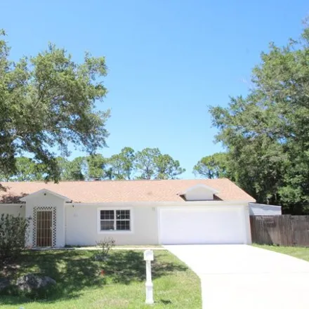 Rent this 3 bed house on 821 Salina Street Southeast in Palm Bay, FL 32909
