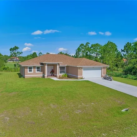 Buy this 3 bed house on 1005 Calvin Avenue in Lehigh Acres, FL 33972
