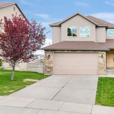 Buy this 4 bed house on 7764 North Decrescendo Drive in Eagle Mountain, UT 84005