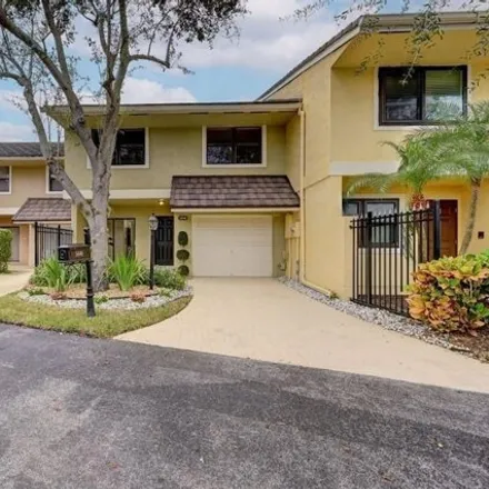 Buy this 3 bed townhouse on 5646 Santiago Circle in Palm Beach County, FL 33433