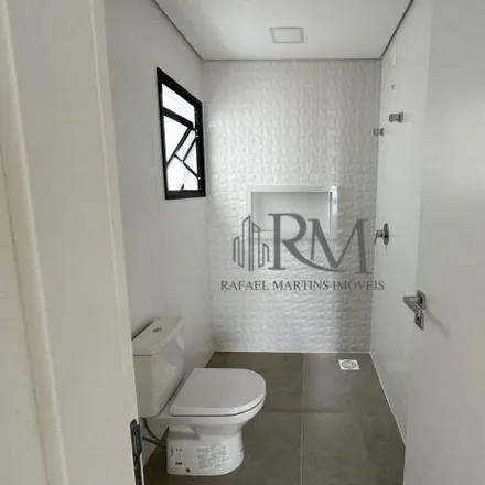 Buy this 3 bed house on Fórum de Justiça da Comarca de Biguaçu in Rua Barão do Rio Branco 29, Centro