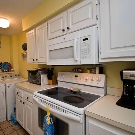 Rent this 3 bed condo on Indian Beach in NC, 28575