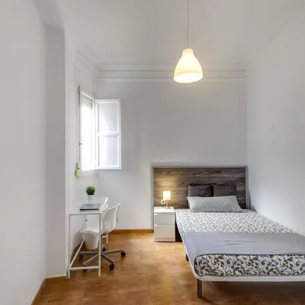 Rent this 7 bed room on Plaça de Margarita Valldaura in 46001 Valencia, Spain