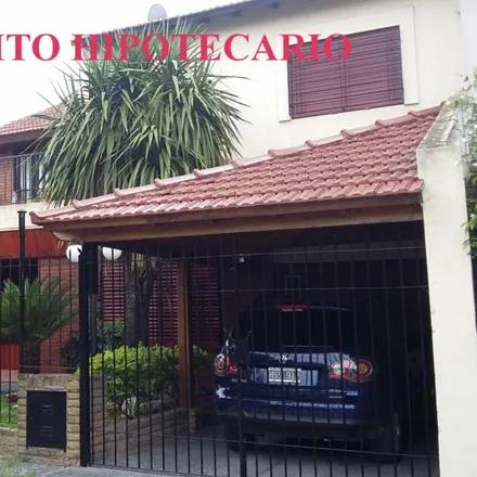 Buy this 7 bed house on Carapachay 4077 in Partido de Morón, B1708 FEU Castelar