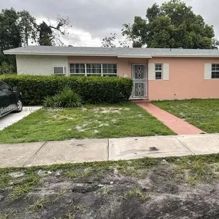 Buy this 3 bed house on U-Haul in Northwest 27th Avenue, Carol City