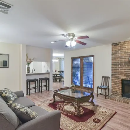 Rent this 2 bed condo on 1309 Memory Lane in Arlington, TX 76011