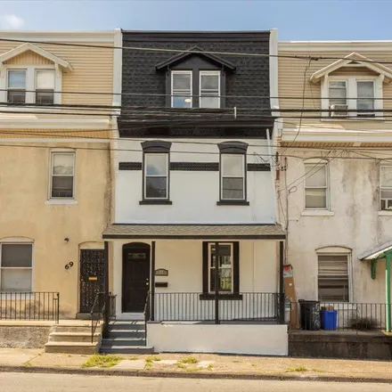 Buy this 5 bed townhouse on 71 East Coulter Street in Philadelphia, PA 19144