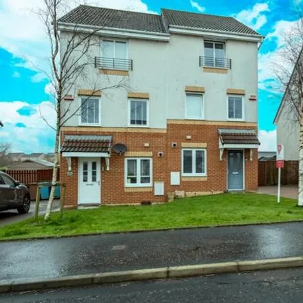 Buy this 4 bed townhouse on Clarkston Primary School in Findhorn Place, Airdrie