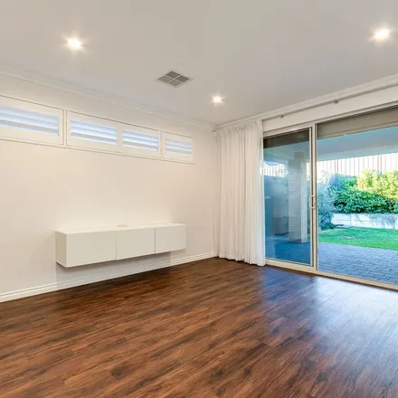 Rent this 3 bed apartment on Cosimo Drive in Woodvale WA 6026, Australia