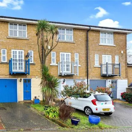 Buy this 4 bed townhouse on 7 Hampton Close in London, N11 3PR