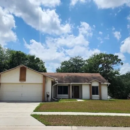 Rent this 3 bed house on Oak Valley Drive in Kissimmee, FL 34744