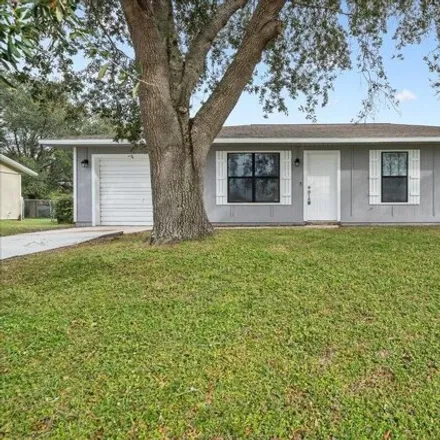 Buy this 3 bed house on 1159 Lynbrook Street Northwest in Palm Bay, FL 32907