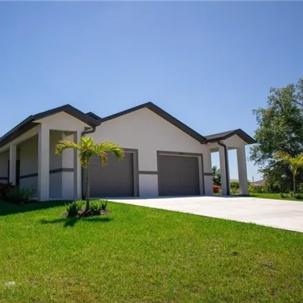 Rent this 3 bed house on 1145 Ivan Avenue South in Lehigh Acres, FL 33973