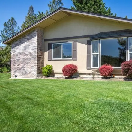 Buy this 4 bed house on 1537 Angel Crest Drive in Medford, OR 97504