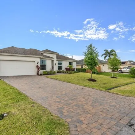 Buy this 5 bed house on 475 Southwest Lakota Avenue in Port Saint Lucie, FL 34953