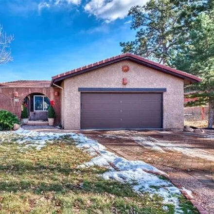 Buy this 4 bed house on 15 Woodmen Court in Colorado Springs, CO 80919