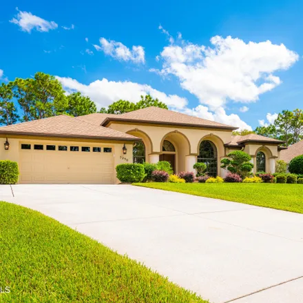 Buy this 3 bed house on 5290 Championship Cup Lane in Spring Hill, FL 34609